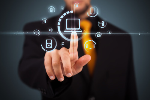 Businessman pressing multimedia type of modern buttons with virtual background Businessman pressing multimedia type of modern buttons with virtual background